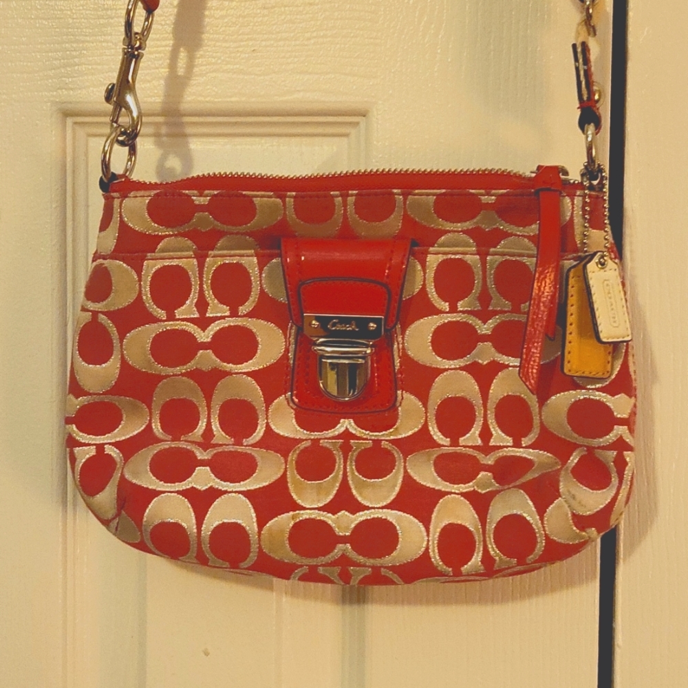 Pink Coach crossbody purse